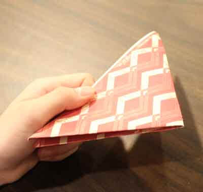 3D Paper Snowflake Tutorial - Hold paper to cut