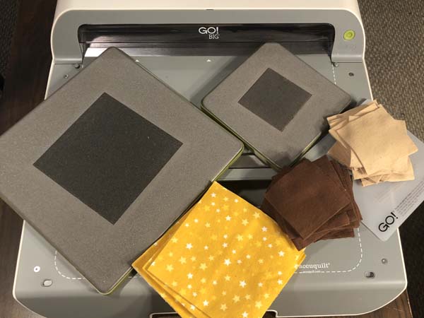 Accuquilt Go Cutter with 2 dies, mat and cut fabrics