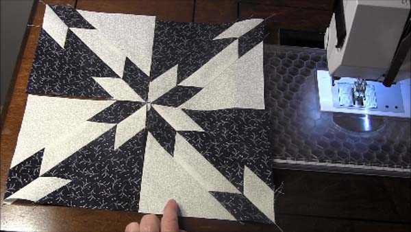 Accuquilt Hunters Star Block Assemble Four Sections Together