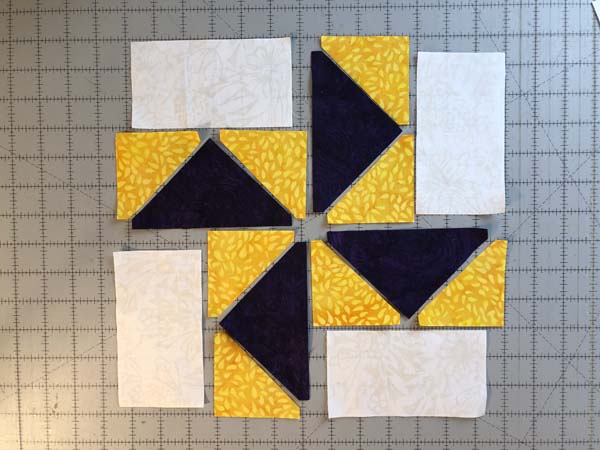 Accuquilt Louisiana Block 14 Fabrics Cut and showing block layout