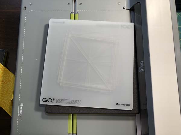 Accuquilt Louisiana Block 7 Mat over dark fabric