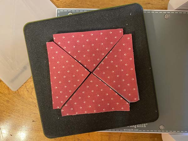 Accuquilt Windy Pinwheel Block pink triangles cut