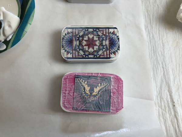 Altoid Tin Calendar Decoupage Glue over photos