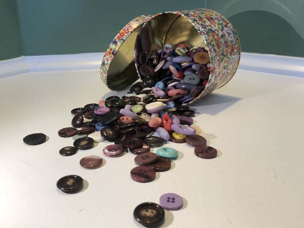 Buttons in Tin Spilled
