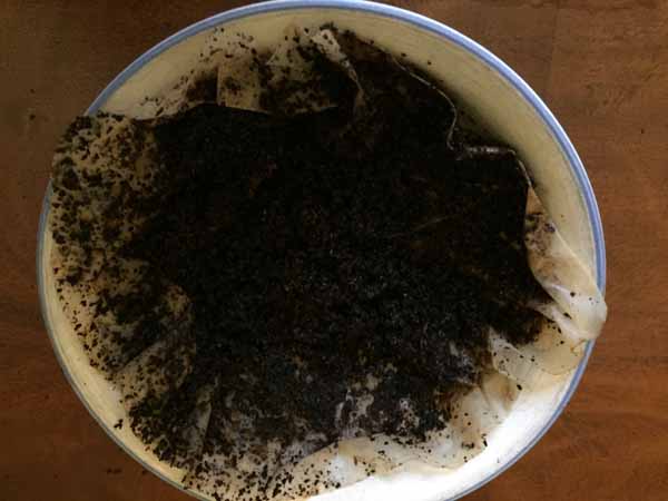 Conceal Furniture Scratches with Coffee Grounds - Wet Grounds