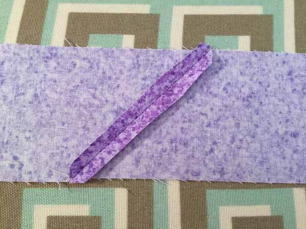 Continuous Binding Strips - Press seam open