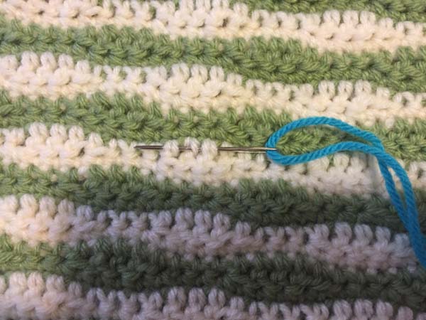 Attach Crochet Applique Tutorial Weave Needle between stitches