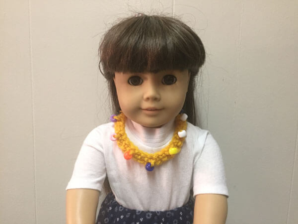 Doll Crocheted Beaded Necklace Tutorial - On Doll