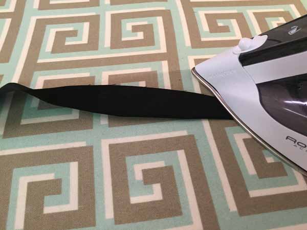 DIY Candy Corn Banner Iron Binding In Half