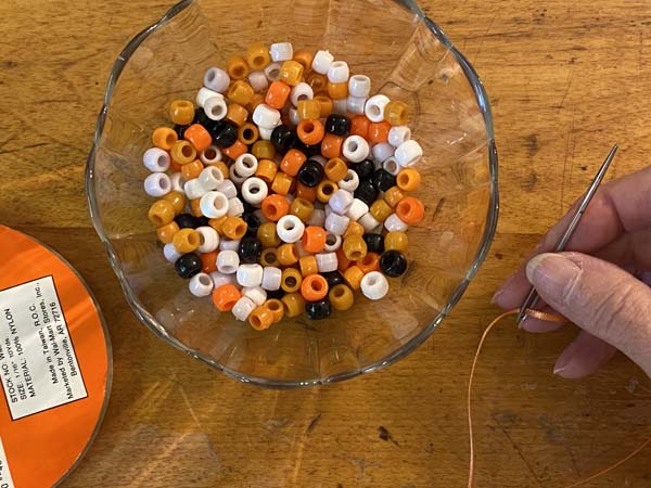 DIY Ghost Garland Thread Ribbon Onto Needle