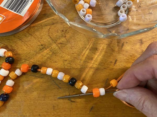 DIY Ghost Garland Tie Off Go Through Two Beads