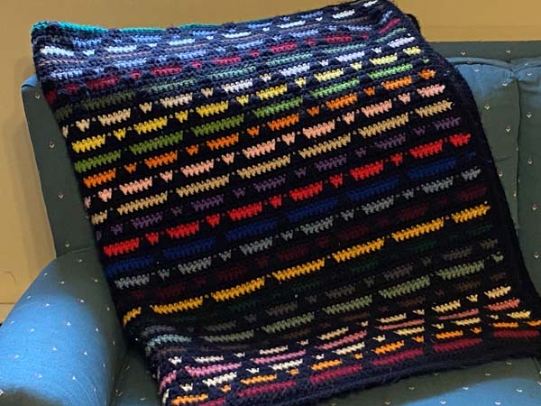 Diamond Overlay Scrapghan Folded on couch