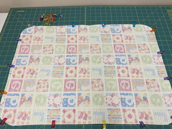 Diaper Changing Pad Clip Layers Together