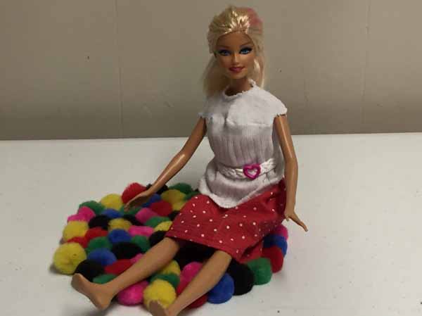 Doll House Pom-Pom Rug Tutorial - Doll Sitting on Rug