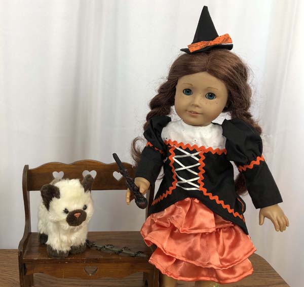 Doll Wand Doll in Witch Costume with Wand cat on bench with wand