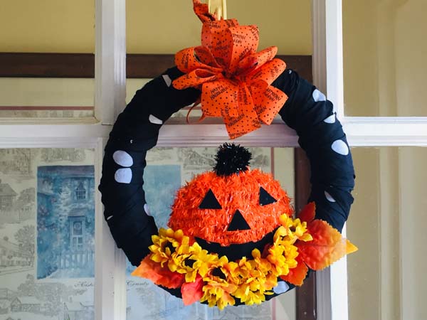Dollar Store Halloween Wreath Finished on Door