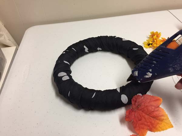 Dollar Store Halloween Wreath Hot Glue Leaves
