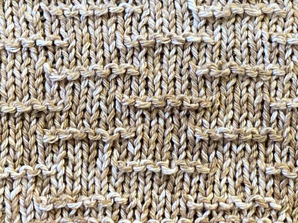 Farmhouse Inspired Knitted Mug Rug Closeup