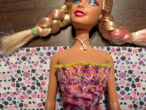 Fashion Doll Dress 9 Lay doll on fabric