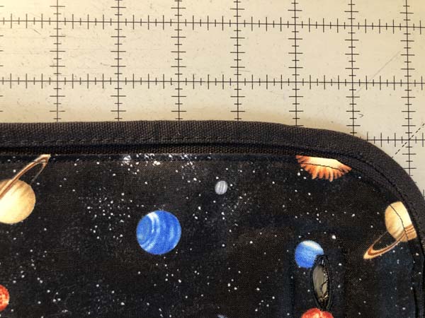 Field Bag Fix Line 24 Closeup of Stitching and Buttonhole