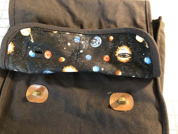 Field Bag Fix Line 25 Stitched around clasps to hold buttonhole open