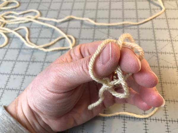 Finger Knitted Bracelet 4 Grab Working Yarn