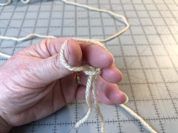 Finger Knitted Bracelet 6 Fingers Through Hole Again