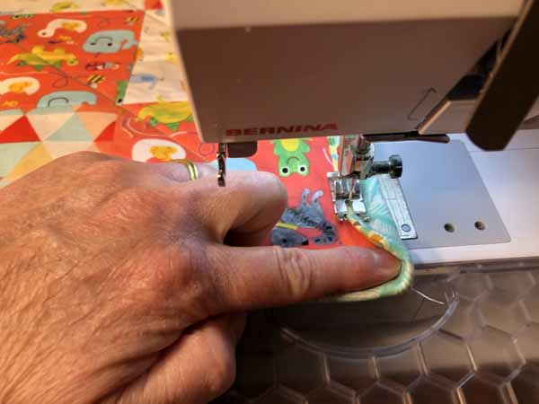 Flange Quilt Binding Push Under Corner