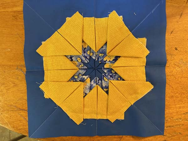 Folded Star Potholder 18 4th round complete