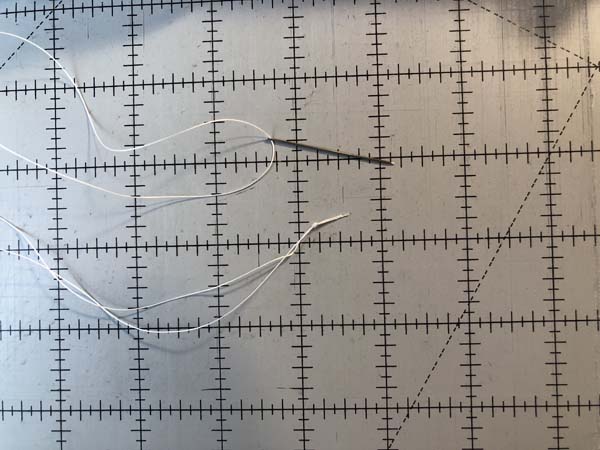 Hand Sew Button 2 Threaded Needle