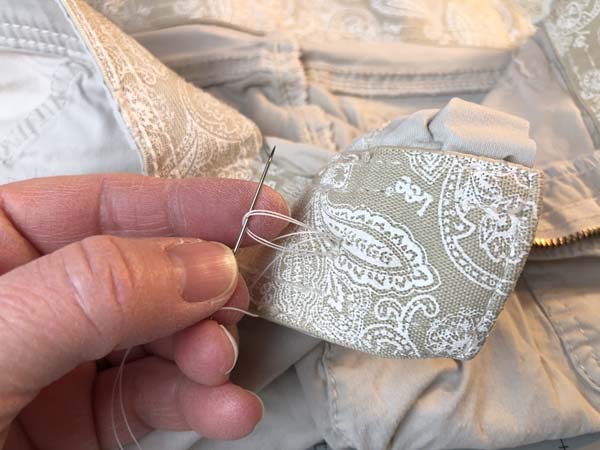 Hand Sew Button 22 Thread through loop twice