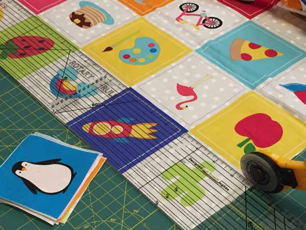 I Spy Quilt Half Square Triangles FabricsCut Panel.JPG