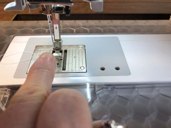 Install a Zipper 7 Needle on left