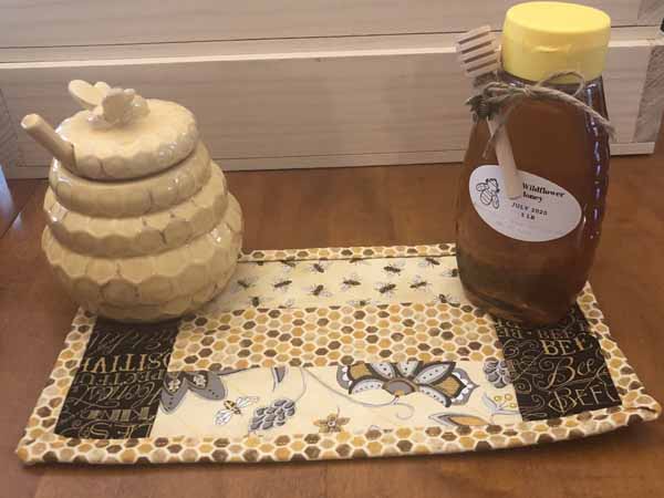 Free Jelly Roll Mug Rug Pattern Finished with Honey and Jug