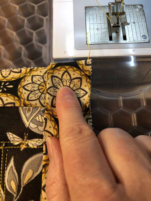 Jelly Roll Mug Rug Fold Binding Down