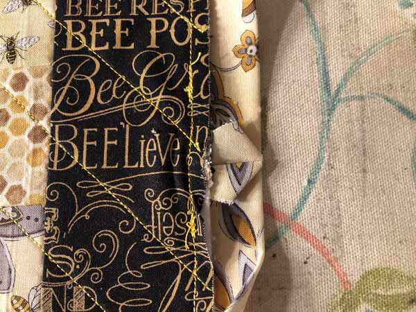 Jelly Roll Mug Rug Fold under points