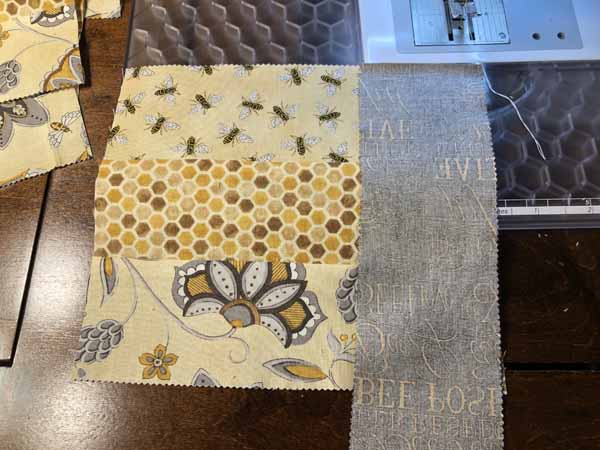 Jelly Roll Mug Rug Sew side strip