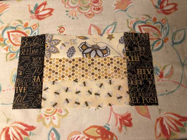 Jelly Roll Mug Rug Top Finished