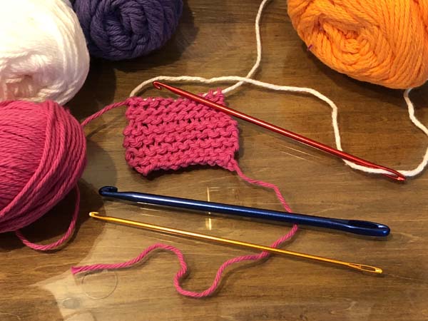 Knooking: Knitting with a Crochet Hook | Needlepointers.com