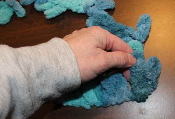 Loop Yarn Criss Cross Stitch Tutorial - Insert into crossed over loop