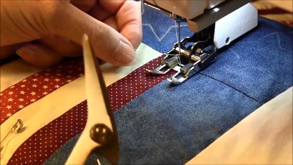 Machine Quilt Stitch in the Ditch Bring Bobbin Up To Top