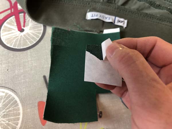 Patch Holes By Pockets In Pants Remove Paper from Heat n Bond