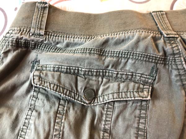 Patch Holes By Pockets In Pants Showing Stitches