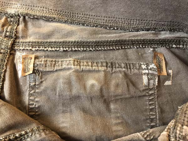 Patch Holes By Pockets In Pants Trimmed Around Patches