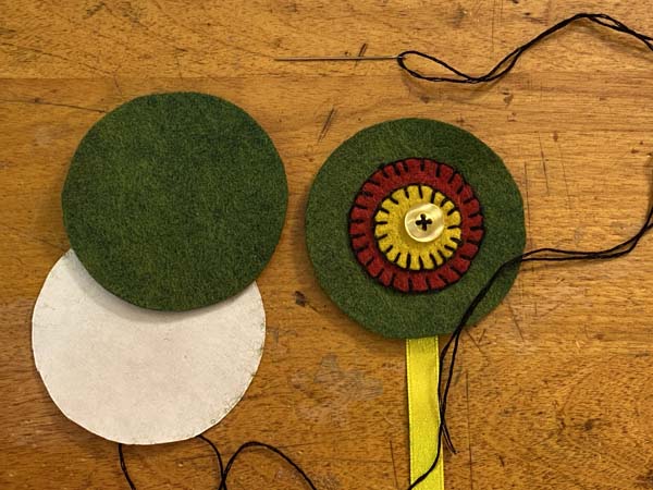 How to Make a Felt Flower Bookmark with Penny Rug Circles | Needlepointers.com how-to-make-a-felt-flower-bookmark-with-penny-rug-circles-needlepointers-com