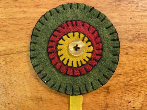 How to Make a Felt Flower Bookmark with Penny Rug Circles | Needlepointers.com how-to-make-a-felt-flower-bookmark-with-penny-rug-circles-needlepointers-com