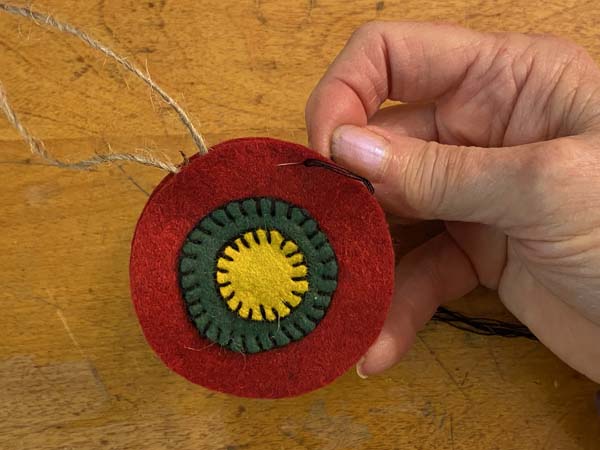 Penny Rug Ornament 26 Needle through same hole