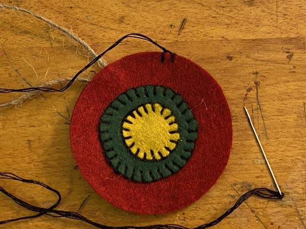 Penny Rug Ornament 30 two stitches complete