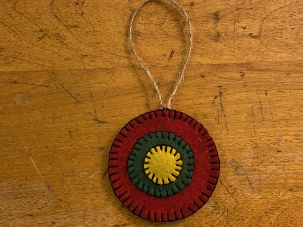 Penny Rug Ornament 31 Stitch Around to attach back