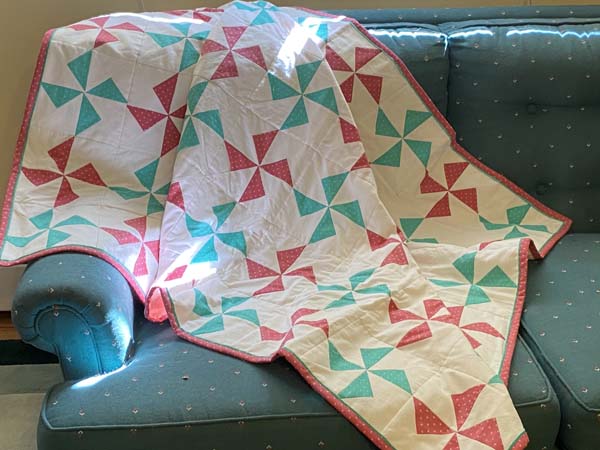 Pinwheel Quilt Draped on Couch